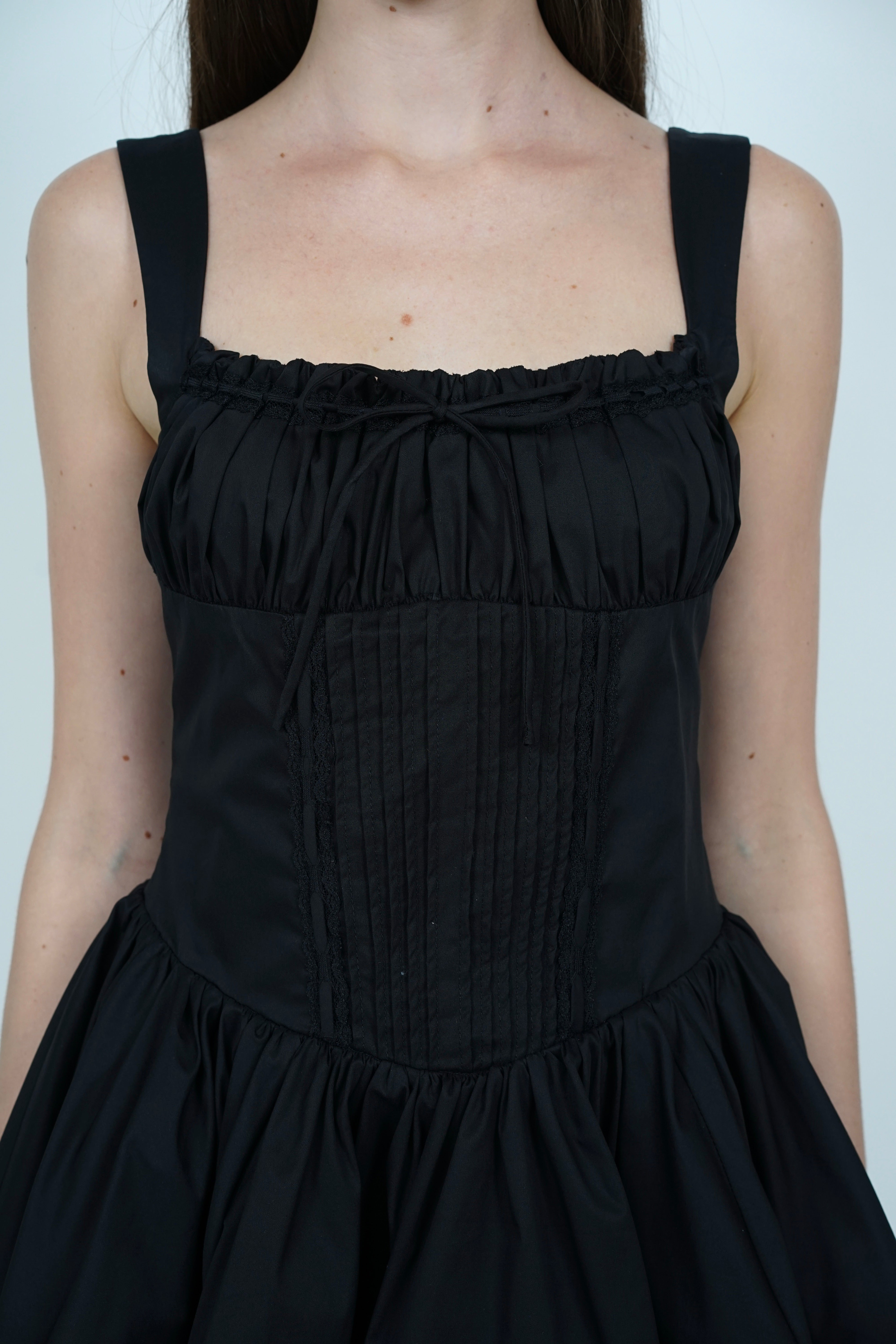 Ruched Pintuck Mini Dress in Black